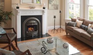 Croft Fireplace classic cast-iron gas fireplace insert in a Victorian mantel with tile hearth and patterned rug