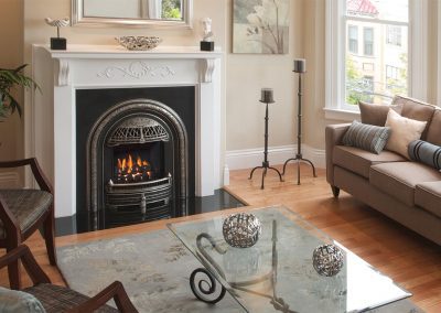 Croft Fireplace classic cast-iron gas fireplace insert in a Victorian mantel with tile hearth and patterned rug