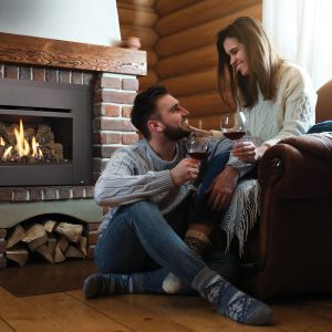 Happy customers enjoying their Croft Fireplace, now more affordable with 0% financing options for 6 months.