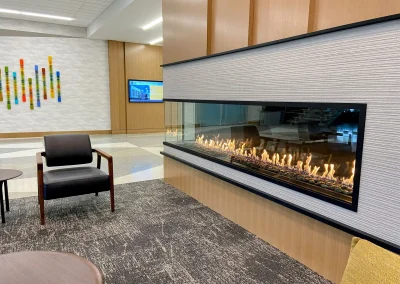 Croft Fireplace linear gas fireplace in a sleek office lobby waiting area